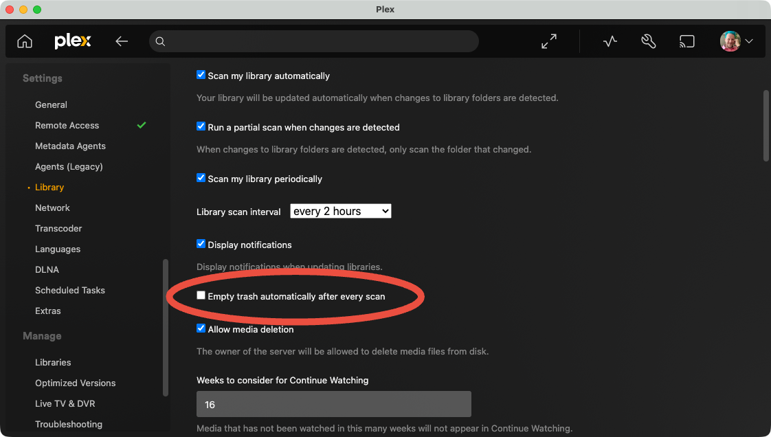 The Plex interface, showing Settings > Server > Settings > Library with the item "Empty trash automatically after every scan" circled in red
