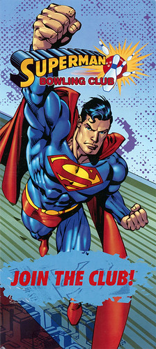 The cover of a pamphlet promoting the Superman Bowling Club. Superman is flying at you in the drawn comic image, and in a starburst border, it says JOIN THE CLUB
